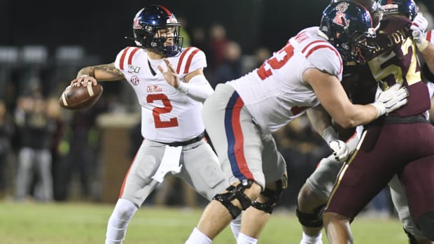 Mississippi Rebels quarterback Matt Corral (2) makes a pass against the Mississippi State Bulldogs during the fourth quarter at Davis Wade Stadium. Mandatory Credit: Matt Bush-USA TODAY Sports